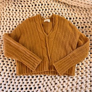 Wilfred le fou yellow sweater